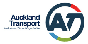 Auckland Transport logo featuring the organization name and a circular AT symbol with red, blue, and green segments, representing an Auckland Council organization providing public transportation