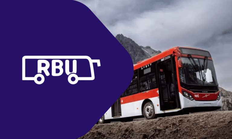 RBU logo on purple background with red and white bus traveling mountain road in scenic landscape setting.