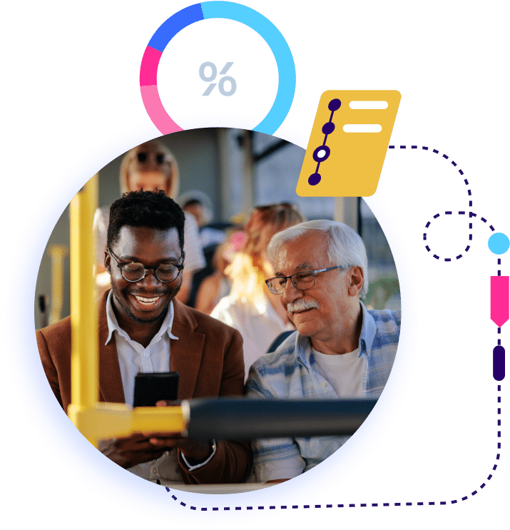 Two professionals smile while collaborating on a tablet device, representing cross-generational teamwork and digital business innovation in a modern workplace setting.