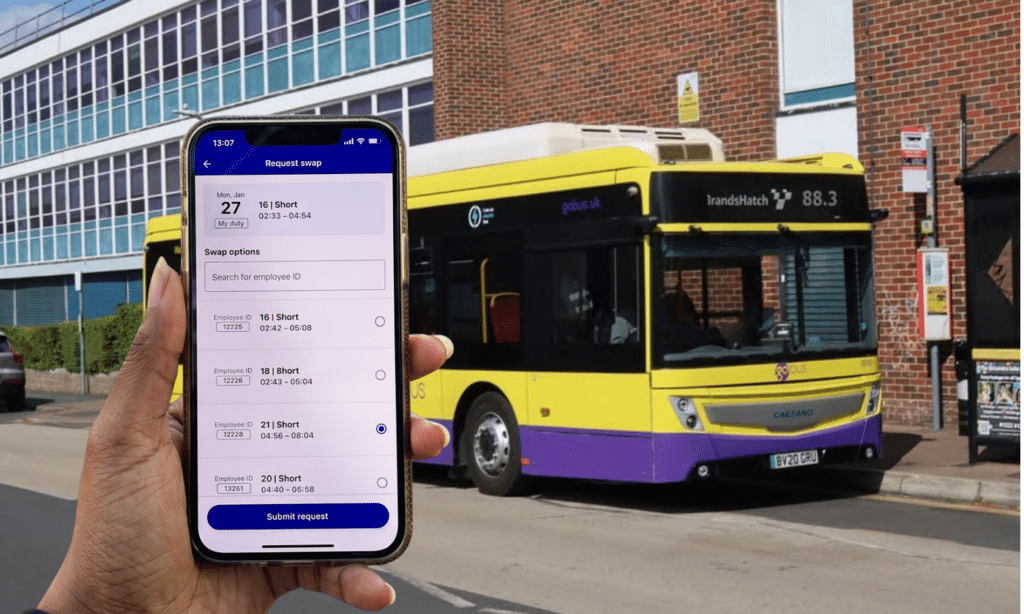 Bus driver shift swap app interface displayed on smartphone with yellow and purple bus visible in background, showing multiple employee scheduling options for January 27th.