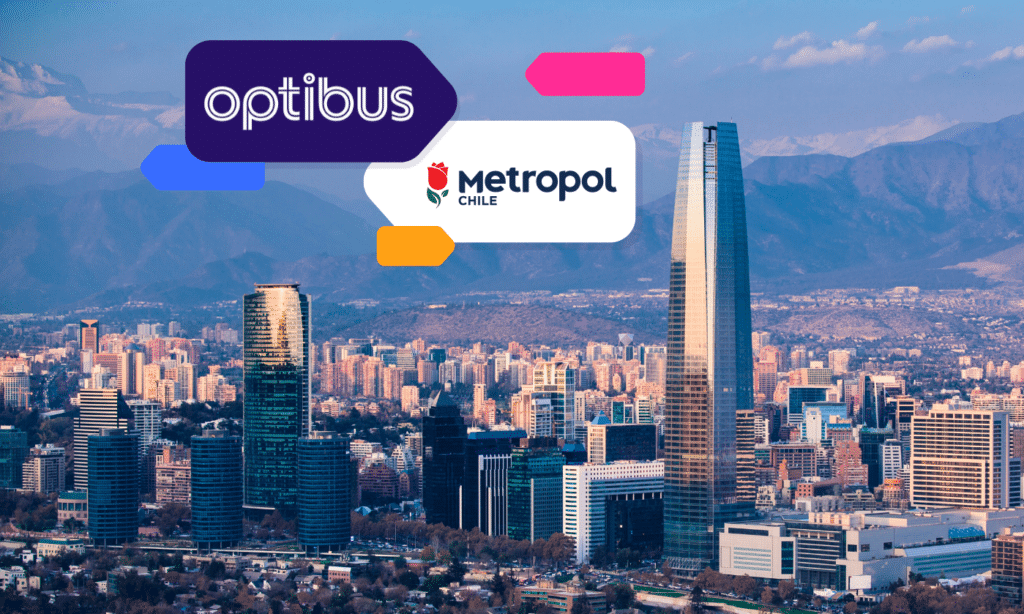 Optibus and Metropol Chile partnership announcement displayed over Santiago's skyline, featuring modern skyscrapers and mountain backdrop, highlighting transit technology collaboration.