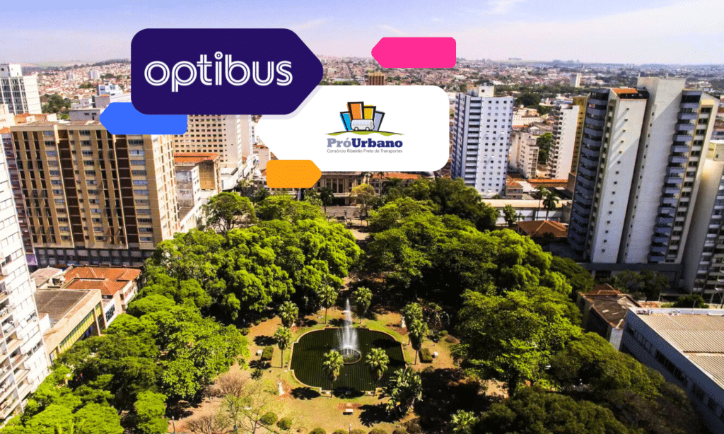 Optibus and Via Urbano partnership logos displayed over an aerial cityscape featuring green park with fountain, modern apartment buildings, and urban development in a sprawling metropolitan area.